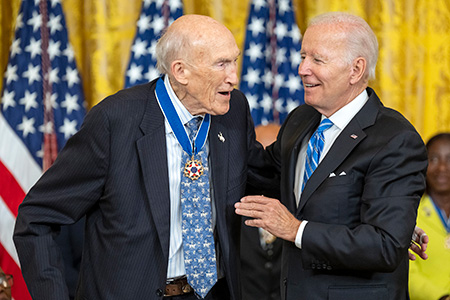 President Biden meets with Alan Simpson